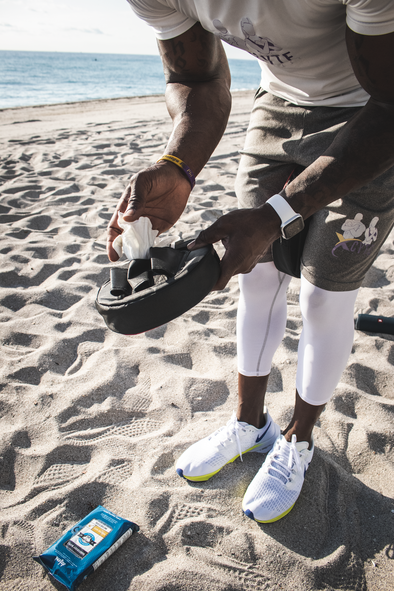 Wiping down weights with Game Face Antibacterial Wipes